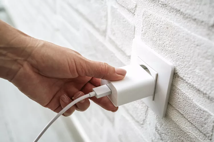 plugging a device into an outlet