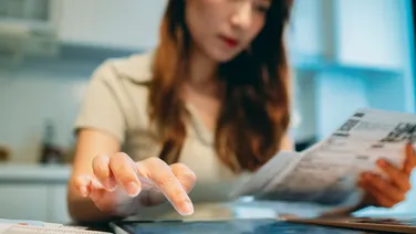 woman paying bills