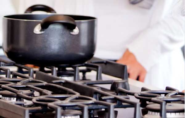 Closeup of pot on a stove