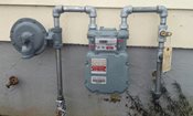 a natural gas meter outside of a house