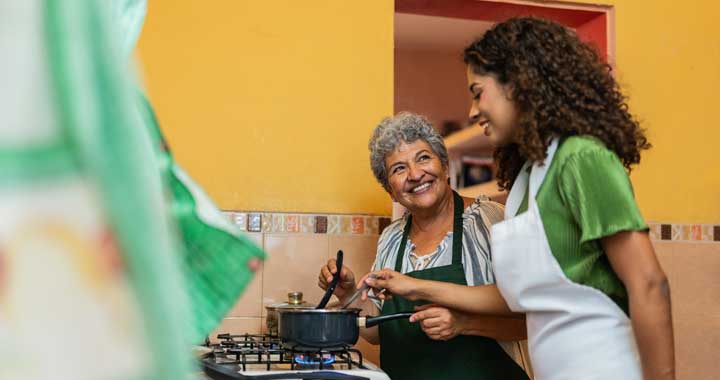 Mother and daughter cooking with Natural Gas